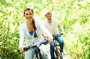 Man and Woman Biking